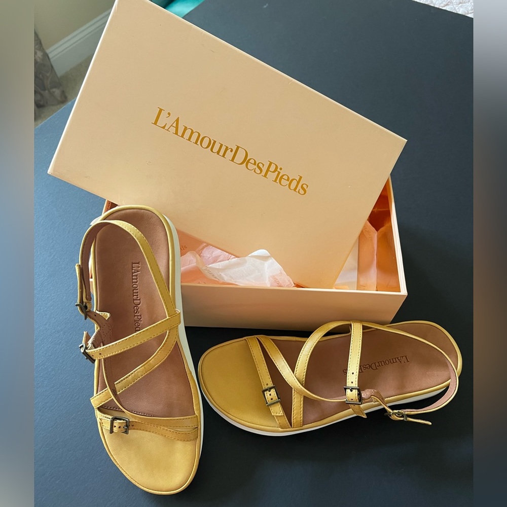 Yellow, L’Amour DesPieds Verdun strappy buckle low platform sandals.